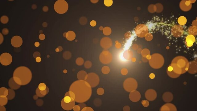 Animation of orange spots and shooting star agaist black background with copy space