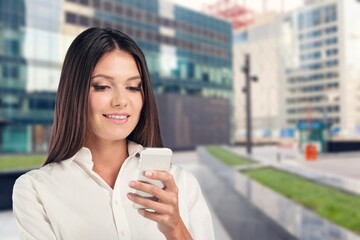 Portrait of a confident young business woman hold smartphone