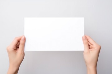 Close Up of Woman's Hand with Blank Paper