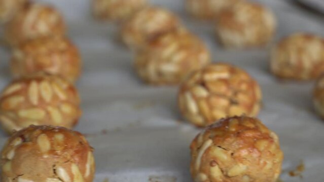 Pine nut panellets fresh from the oven. Typical snack eaten on the feast of All Saints in Catalonia. 