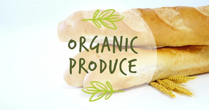 Animation of organic produce text banner against close up of fresh bread and wheat ears