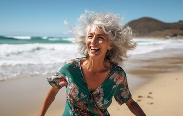 Fototapeta na wymiar A joyful elderly lady in a beach hat, enjoying a serene day at the sandy seashore, under the clear summer sky
