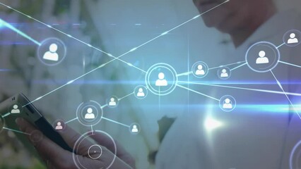 Animation of network of connections and light trails against caucasian senior woman using tablet - Powered by Adobe