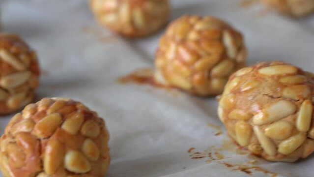 Typical snack eaten on the feast of All Saints in Catalonia. Pine nut panellets fresh from the oven. 