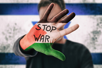 Stop war Palestine Israel with man showing hand with message