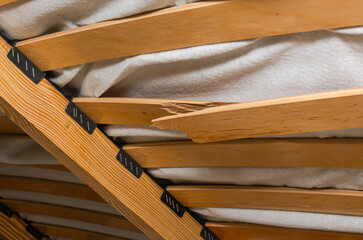 Broken wooden slats on a bed - obrazy, fototapety, plakaty