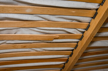 Broken wooden slats on a bed