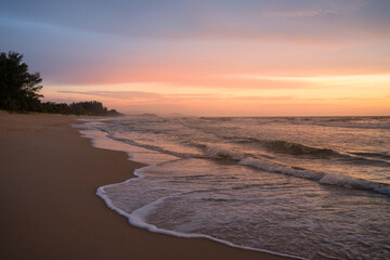 Beautiful Romantic Sunset sea sand beach. Landscape of paradise tropical island beach, sunrise shot. beach landscape. Beautiful cloudscape over the sea sunrise shot.