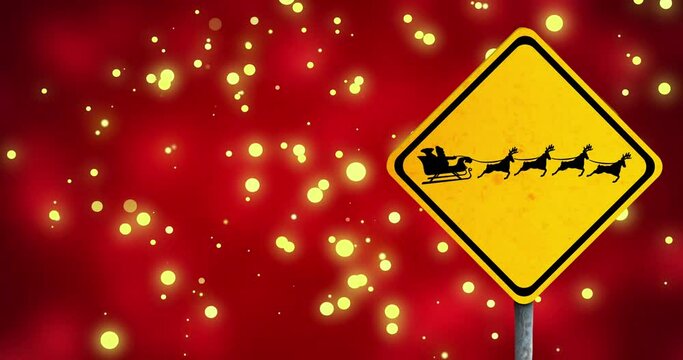 Animation of sign with santa claus over spots of light on red background