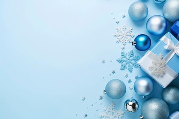 Christmas Eve concept. Top view photo of blue and silver baubles snowflake ornaments stylish present boxes and confetti.