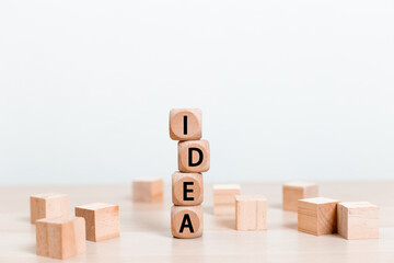 Alphabet text word IDEA on wooden block cube. symbol of creativity, Ideas and creative concepts.