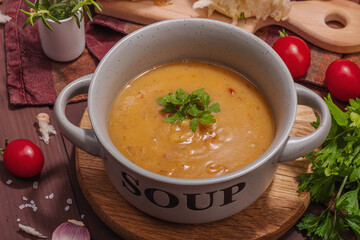 Chickpea-tomato cream soup with fragrant garlic buns. Comfort food, nostalgic mood concept