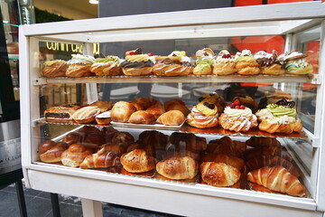 Showcase of a pastry shop in the historic center of Naples, Campania, Italy
