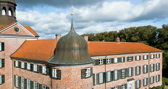 drone flight 4k 60fps surrounding the Castle in "Eutin" on a cloudy day