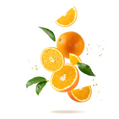 Fresh orange fruit whole and slices with leaves and drops falling flying