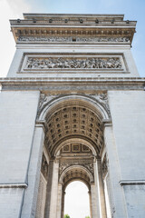 Arc de Triomphe, one of the most famous monuments in Paris, massive triumphal arch, located near...