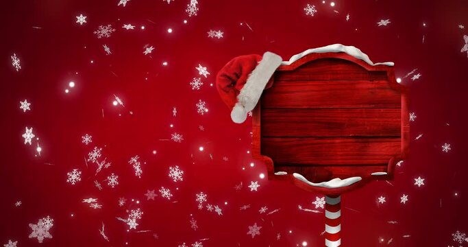Animation of christmas sign with copy space with glowing spots on red background