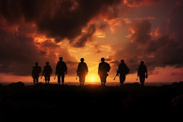 Fototapeta premium Troops silhouettes grace the canvas of a breathtaking, fiery sunset sky