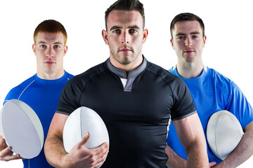 Digital png photo of three focused caucasian rugby players with balls on transparent background