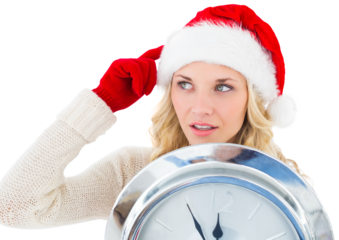 Digital png photo of caucasian woman wearing santa claus hat holding clock on transparent background