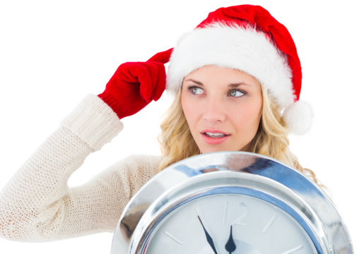 Digital png photo of caucasian woman wearing santa claus hat holding clock on transparent background