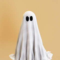 White halloween ghost with black eyes, spooky face, scary concept