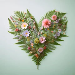 Fotobehang Floral Love Heart Shape Made with Colorful Flowers and Tropical Meadow Herb Fern Leaves on a Light Green Background. Concept of Love, Nature, Natural Forests Plants, and Woods, St Valentines, Marriage © Frank