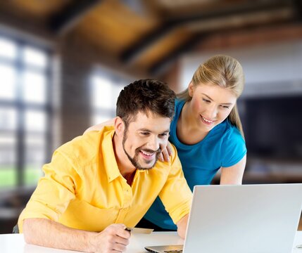 Doing Accounting Happy young Couple with Laptop, AI generated image