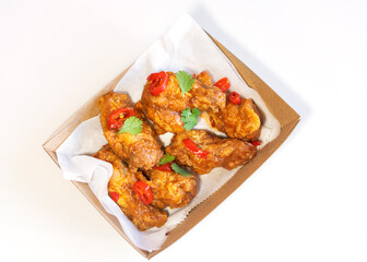 Grilled spicy chicken legs in packs for delivery