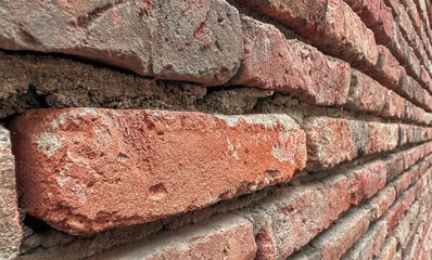 various wall patterns and windows made of red brick
