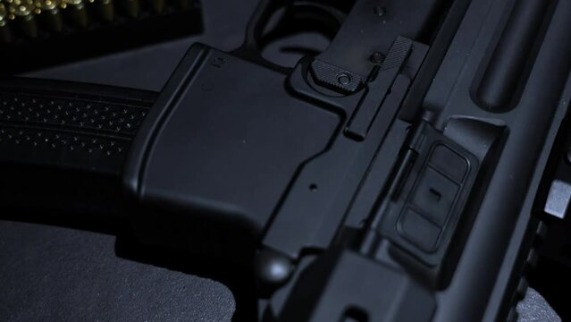 Modern Elegant Assault Rifle and Bullet on Grey Background in Switzerland.