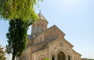 Monastery of St Nino at Bodbe. Kakheti region with people. Sighnaghi