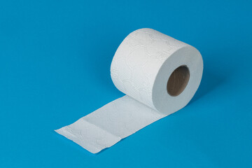 One roll of white toilet paper on blue background