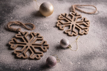 photo in a horizontal winter photograph, a round toy Christmas ornament A scene of December celebration, the sphere-shaped Christmas ornaments grace the background, evoking the holiday spirit 