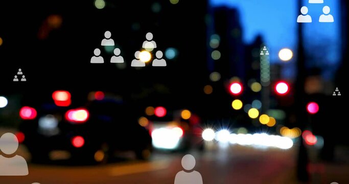 Animation of profile icon flowcharts over blurred vehicles stopped on red signal in street of city
