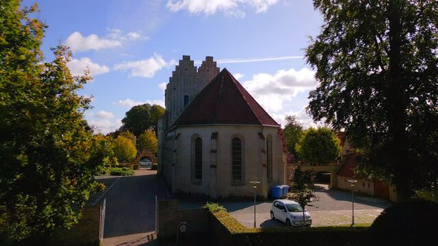 Aerial shot of Fredens church on a sunny day in Odense, Denmark