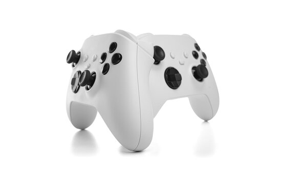 White wireless gamepad controller joystick isolated on a white background.