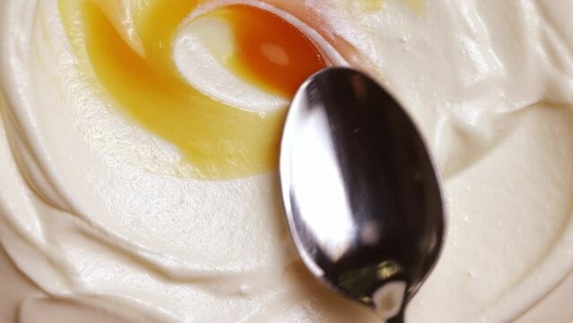 Mixing salted or sweet with sour cram, Greek yogurt. Making healthy breakfast. Yummy dairy products. Concept of texture of food, taste, organic products
