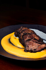 barbecue dish of beef brisket brisket served with dijon mustard and chef mashed potatoes