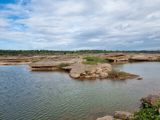 fresh air sampanbok amazing rock in mekong river water pond ubon ratchathani thailand. beautiful natural place in summer season.