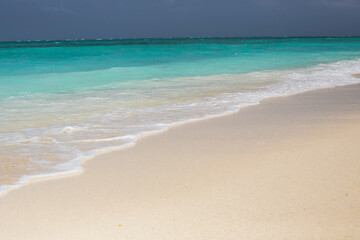 Fototapeta na wymiar Beautiful beach at Zanzibar. Paradise beach with blue water in Kendwa village, Zanzibar, Tanzania