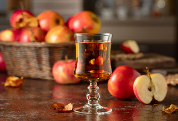 Apple juice on an old kitchen table.