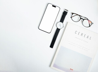 smartphone, watch, glasses and magazine