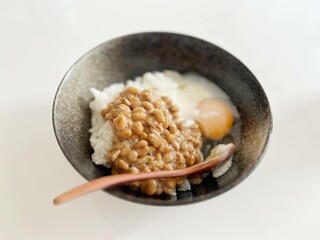 Japanese white rice with fermented beans and raw egg