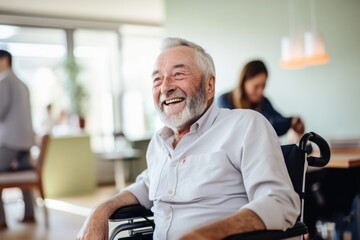 Fototapeta na wymiar Portrait of a senior man in a wheelchair at the nursing home