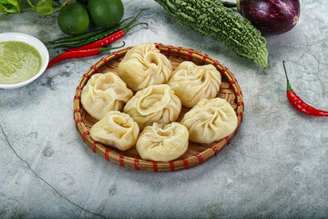 Nepali steamed dumplings  Momo with sause