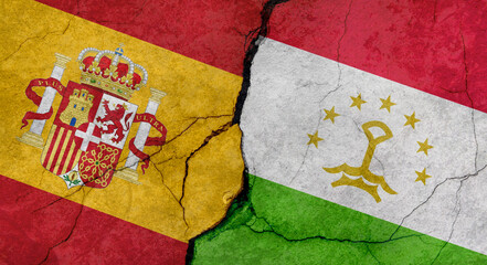 Spain and Egypt flags, concrete wall texture with cracks, grunge background, military conflict concept