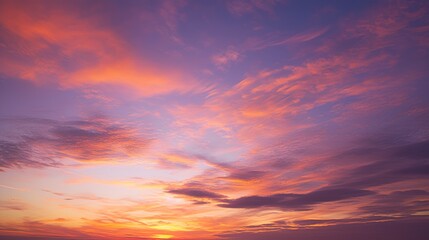 Obraz premium Beautiful Vivid sky painted by the sun leaving bright golden shades.Dense clouds in twilight sky in winter evening.Image of cloud sky on evening time.Evening Vivid sky with clouds.