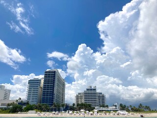 Giant clouds loom over the beach in Miami hotel and condominium buildings 