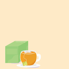 cup of tea along box of tea bags on color background